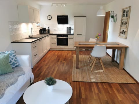 Kitchen or kitchenette, Living room, Seating area, Dining area