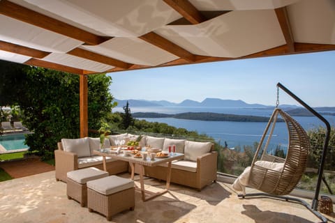 Patio, Nearby landmark, Day, Natural landscape, View (from property/room), Balcony/Terrace, Living room, Seating area, Mountain view, Pool view, Sea view, Swimming pool, sunbed