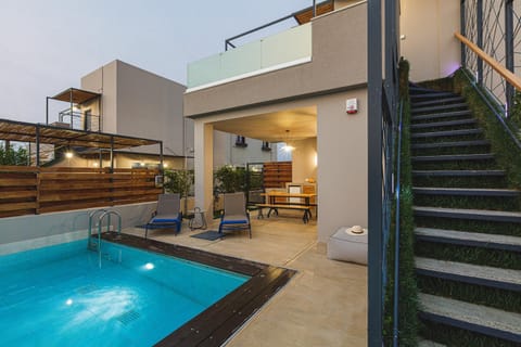 Property building, Swimming pool, Sunset, sunbed