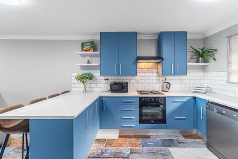 Dining area, dishwasher, microwave, stove, washing machine, kitchen