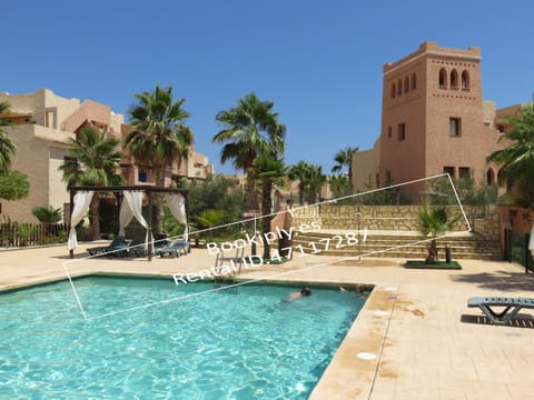 Property building, Living room, Swimming pool