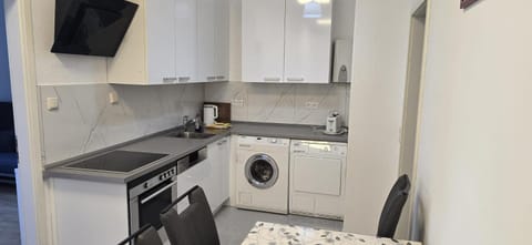 Kitchen or kitchenette, Dining area, dishwasher, stove, washing machine, dryer, kitchen, kitchen