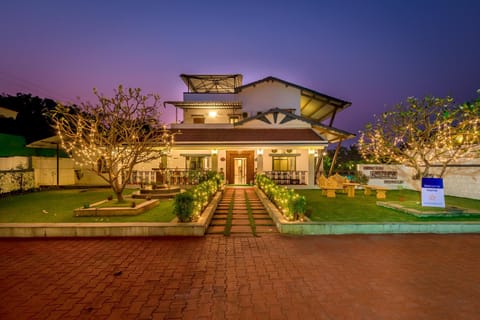 Property building, Facade/entrance, Night, Garden, Seating area, Garden view