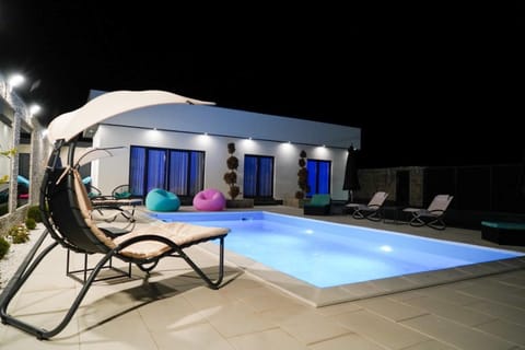 Property building, Night, Pool view, Swimming pool