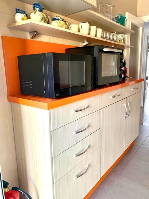 Kitchen or kitchenette, microwave, oven