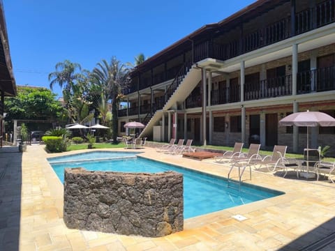 Property building, Patio, Day, Pool view, Swimming pool, sunbed