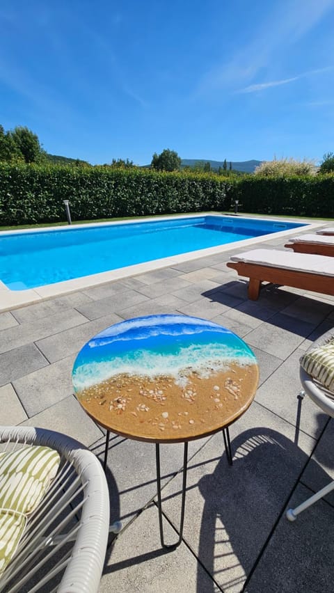 Patio, Day, Natural landscape, Pool view, Swimming pool, sunbed