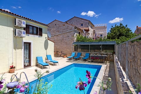 Patio, Day, Pool view, Swimming pool, sunbed