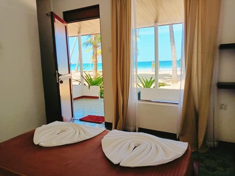 Bed, Beach, Sea view, towels