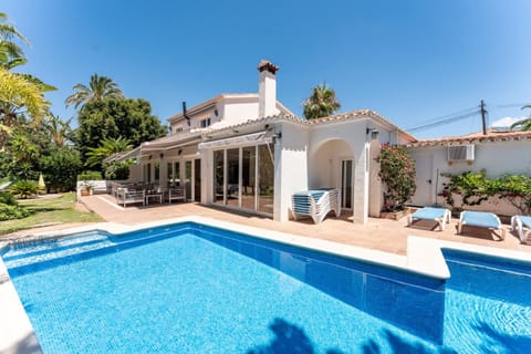 Property building, Living room, Swimming pool
