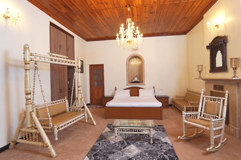 Bed, Seating area, Bedroom