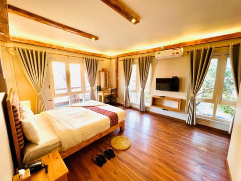Bed, TV and multimedia, Coffee/tea facilities, Seating area, Bedroom, wardrobe, air conditioner