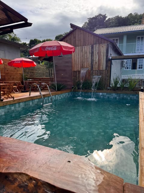 Property building, Swimming pool, sunbed