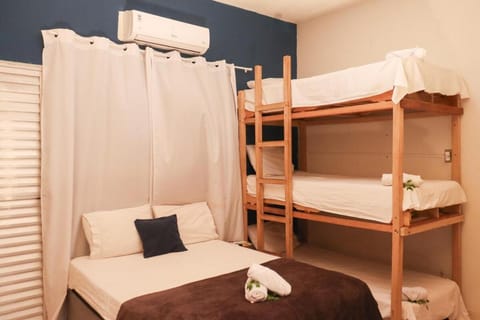 Bed, Photo of the whole room, Bedroom, bunk bed, towels, air conditioner