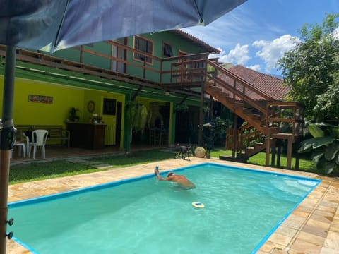 Pousada Casa de mãe aconchegante com piscina próximo à praia Apartment in Angra dos Reis