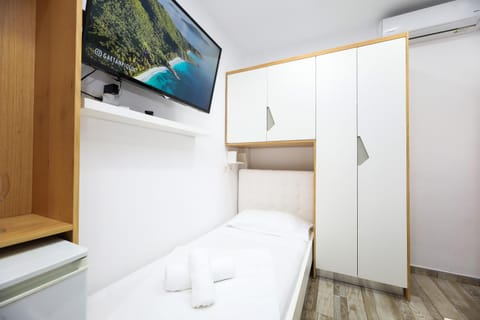 Bed, wardrobe