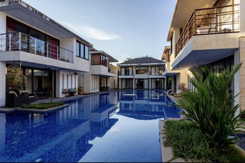 Property building, Pool view, Swimming pool, sunbed