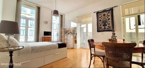 Bed, Living room, Seating area, Dining area