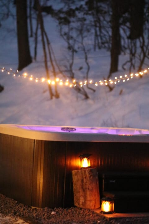 Escape in our Rain-Forest A-Frame Retreat with Hot Tub at The Kairos Cabin Cabin in Luzerne County