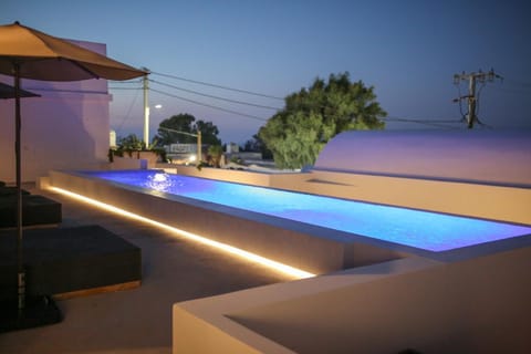 Patio, Night, Pool view, Swimming pool, sunbed