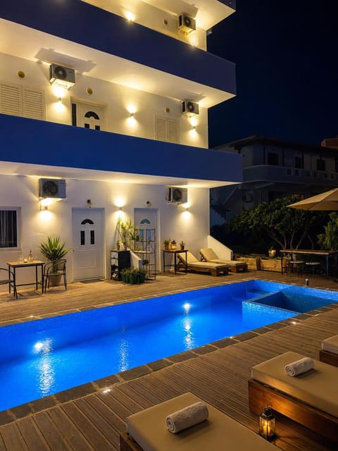 Property building, View (from property/room), Pool view, Swimming pool, sunbed