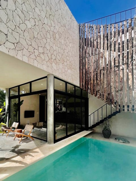 Property building, Patio, Day, Pool view, Swimming pool