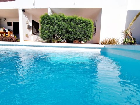 Property building, Swimming pool, sunbed