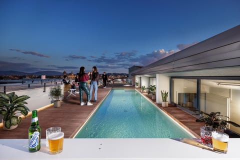 View (from property/room), City view, Landmark view, Mountain view, Pool view, Swimming pool