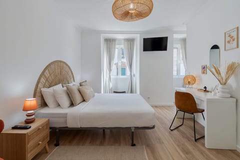 Bed, TV and multimedia, Seating area, Bedroom, hair dresser