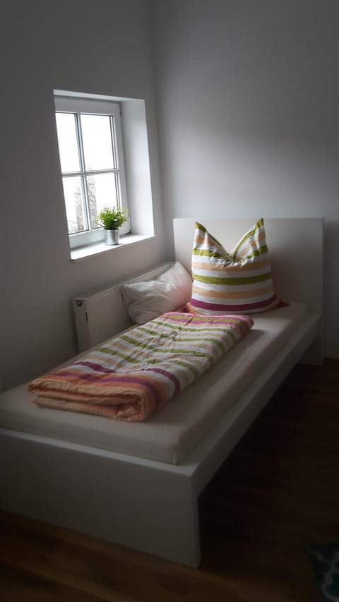 Bed, Seating area, Bedroom