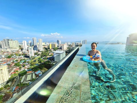 Property building, Swimming pool, Sunrise, Sunset, sunbed