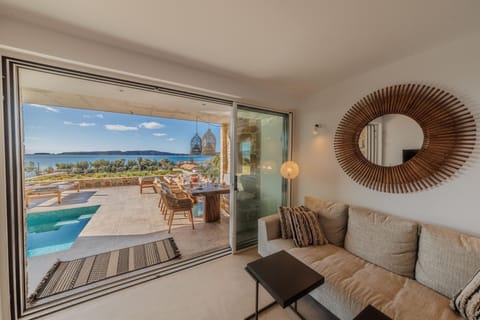 Patio, Natural landscape, View (from property/room), Balcony/Terrace, Living room, Seating area, Pool view, Sea view, Swimming pool, sunbed