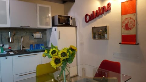 Kitchen or kitchenette, toaster