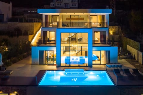 Property building, Patio, Night, Pool view, Swimming pool, sunbed