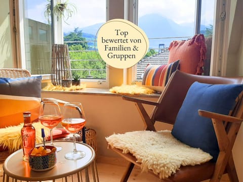 Natural landscape, Living room, Seating area, Dining area, Mountain view, Drinks