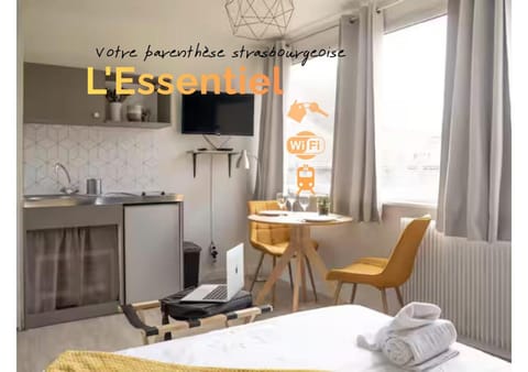 Property building, TV and multimedia, View (from property/room), Kitchen or kitchenette, Dining area, Text overlay