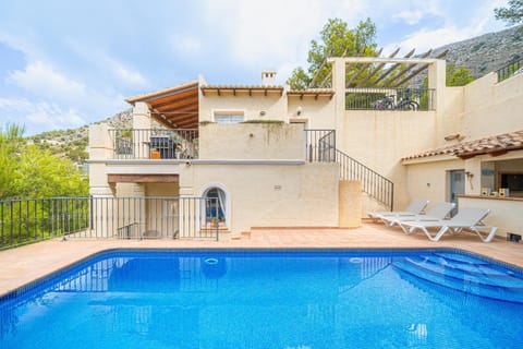 Property building, Living room, Swimming pool