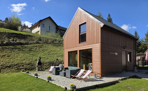 Property building, Facade/entrance, Spring, Day, Activities, Summer, BBQ facilities, Garden, Area and facilities, furniture, sunbed