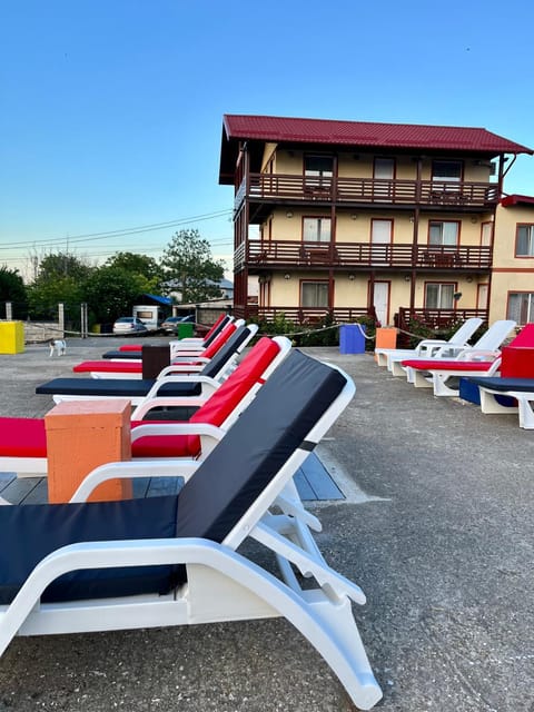 Property building, Day, Beach, Evening entertainment, sunbed