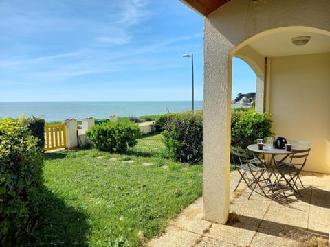 Property building, Patio, Day, Natural landscape, Garden, View (from property/room), Dining area, Garden view, Sea view