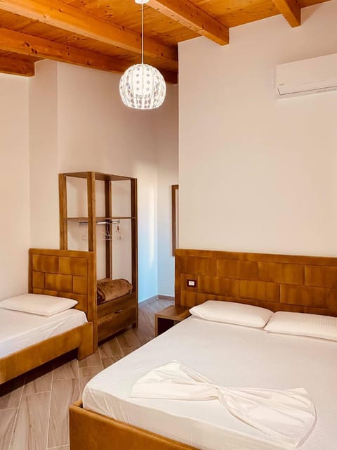 Bed, Photo of the whole room, Bedroom, towels, air conditioner