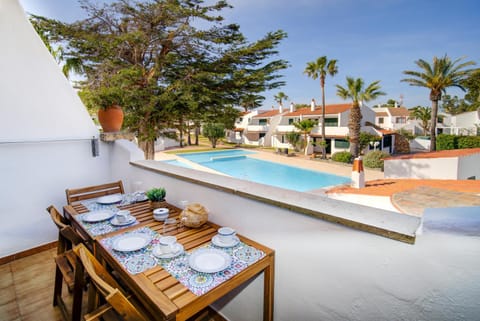 Property building, Patio, Off site, Day, Neighbourhood, View (from property/room), Balcony/Terrace, Dining area, Pool view, Swimming pool