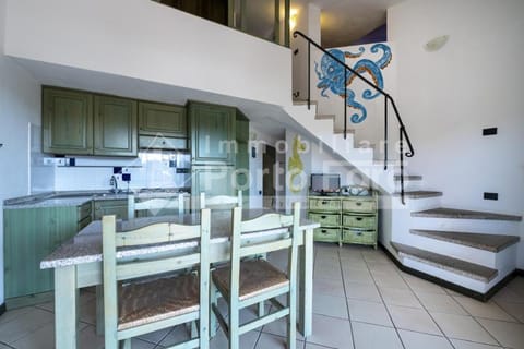 18 BAIA FARO - Grazioso bilocale mansardato a Baia del Faro Villa in Palau