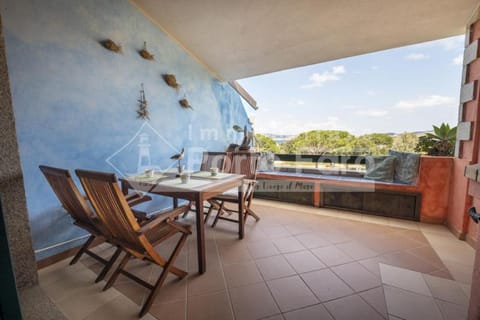 23 BAIA FARO - Trilocale mansardato con ampia terrazza vista mare Villa in Palau