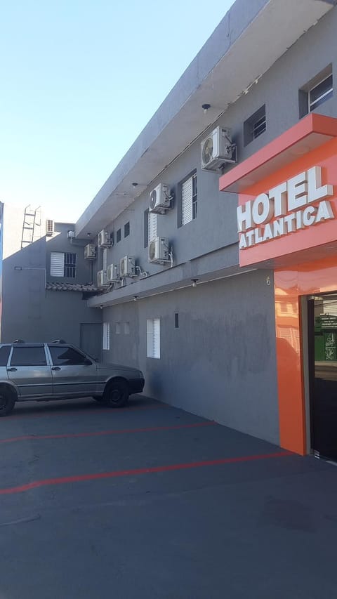 Property building, Facade/entrance, Day, Parking