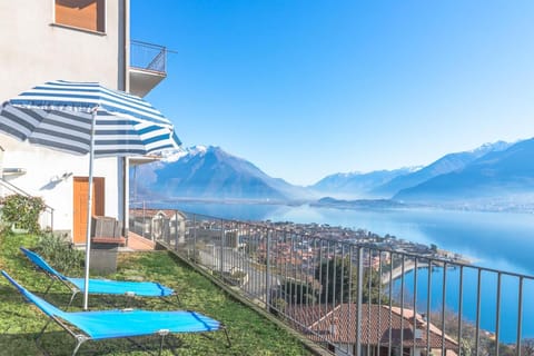 Property building, Patio, Nearby landmark, Spring, Day, Natural landscape, View (from property/room), Balcony/Terrace, Beach, City view, Lake view, Lake view, Mountain view, sunbed