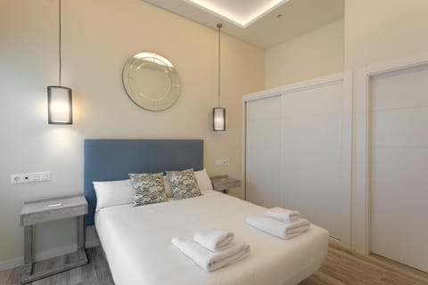 Bed, Photo of the whole room, Bedroom, towels, wardrobe