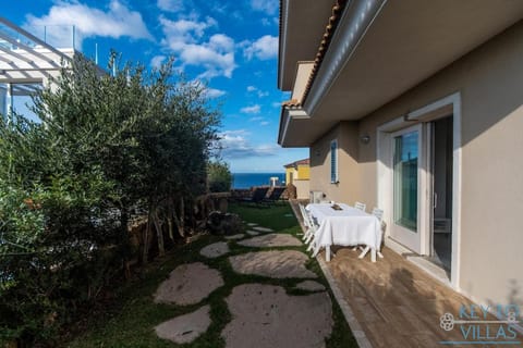 Property building, Patio, Spring, Day, View (from property/room), Balcony/Terrace, Sea view