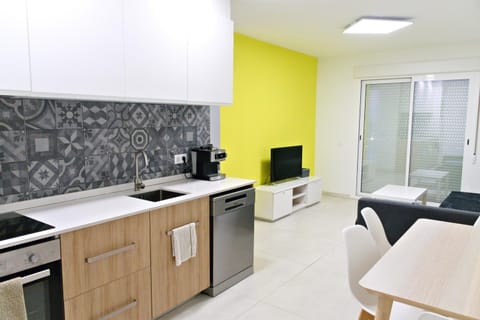 TV and multimedia, Balcony/Terrace, Balcony/Terrace, Kitchen or kitchenette, Living room, Dining area, dishwasher, oven, stove, washing machine, air conditioner, air conditioner