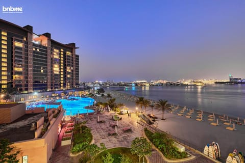 Property building, Nearby landmark, Night, Natural landscape, City view, Pool view, Sea view, Swimming pool